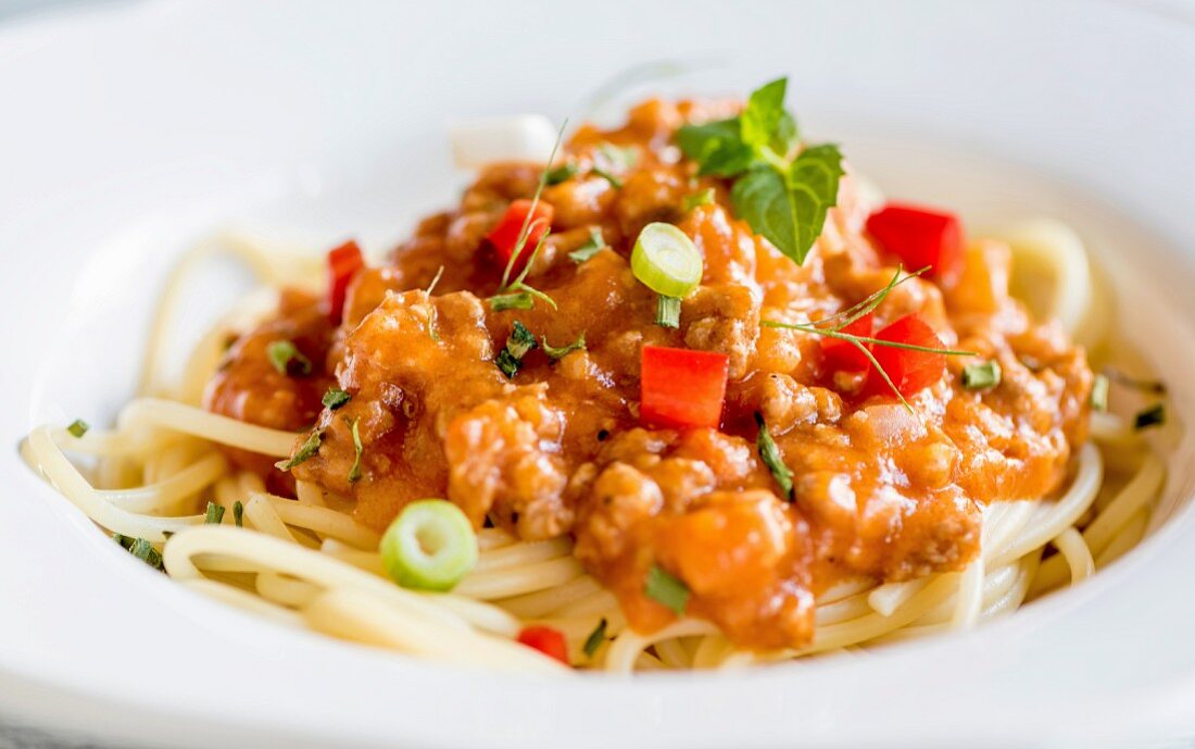 Close up to bolognese sauce on spaghetti