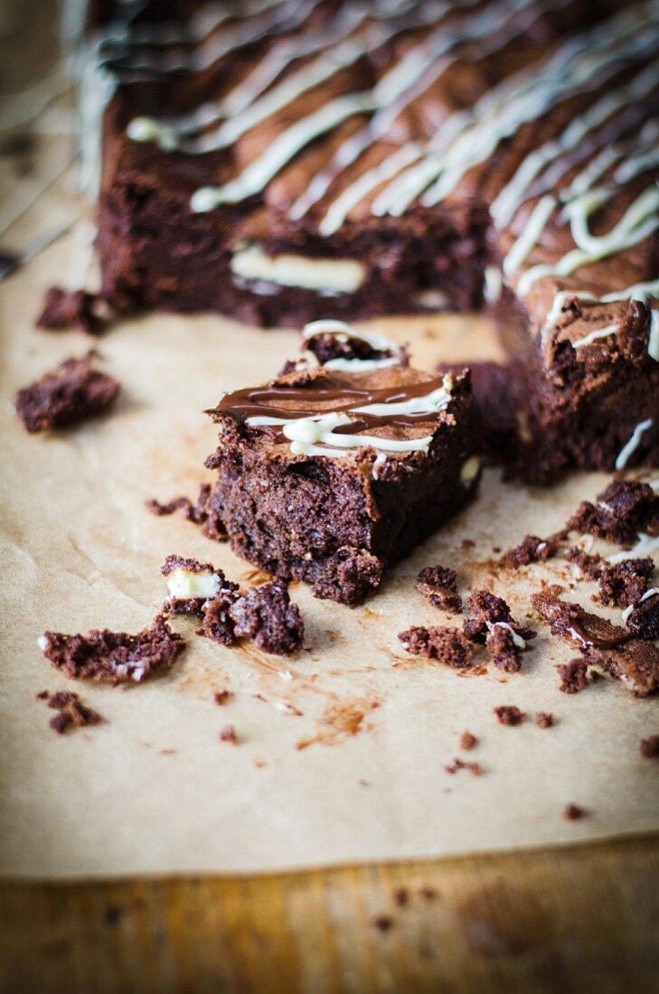 Chocolate brownie with dark and white drizzle