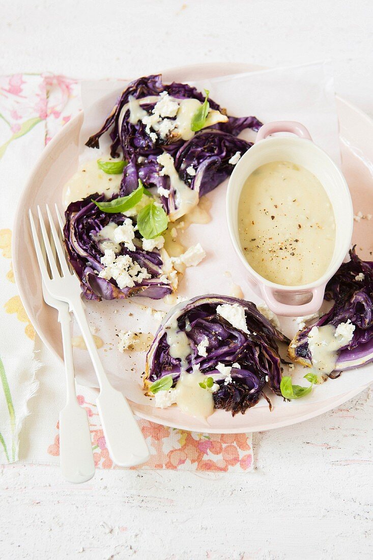 Fried red cabbage with onion sauce and feta
