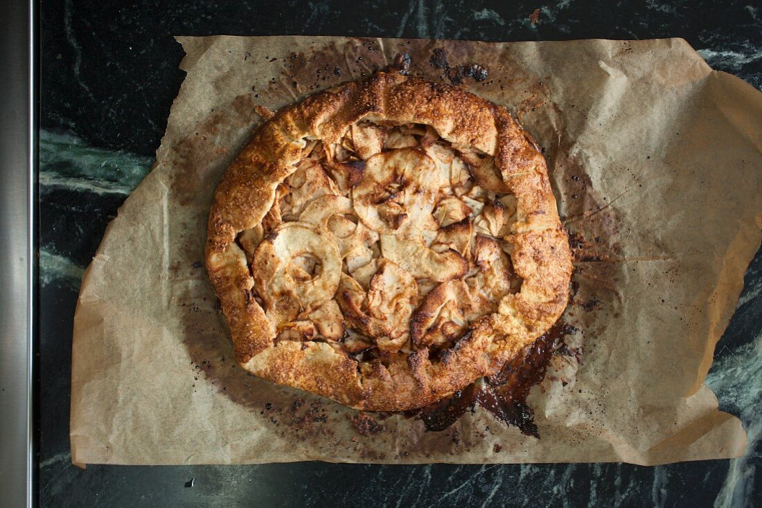 Apple tart on grease-proof paper