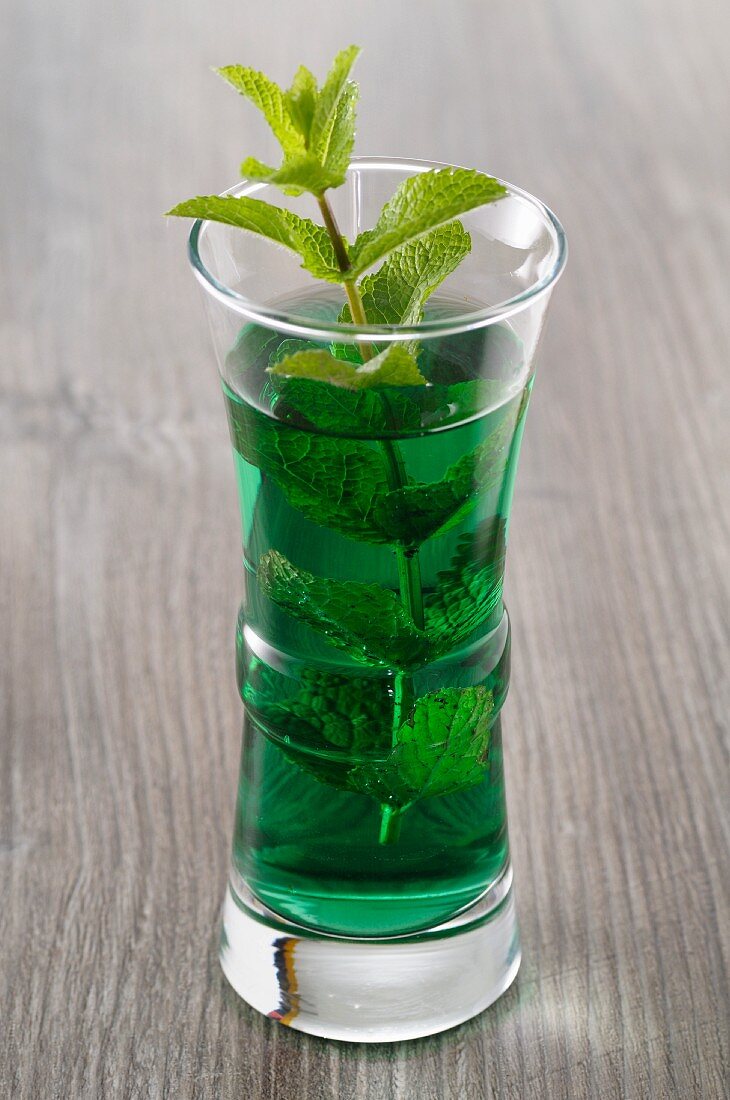 Green mint liqueur in a glass