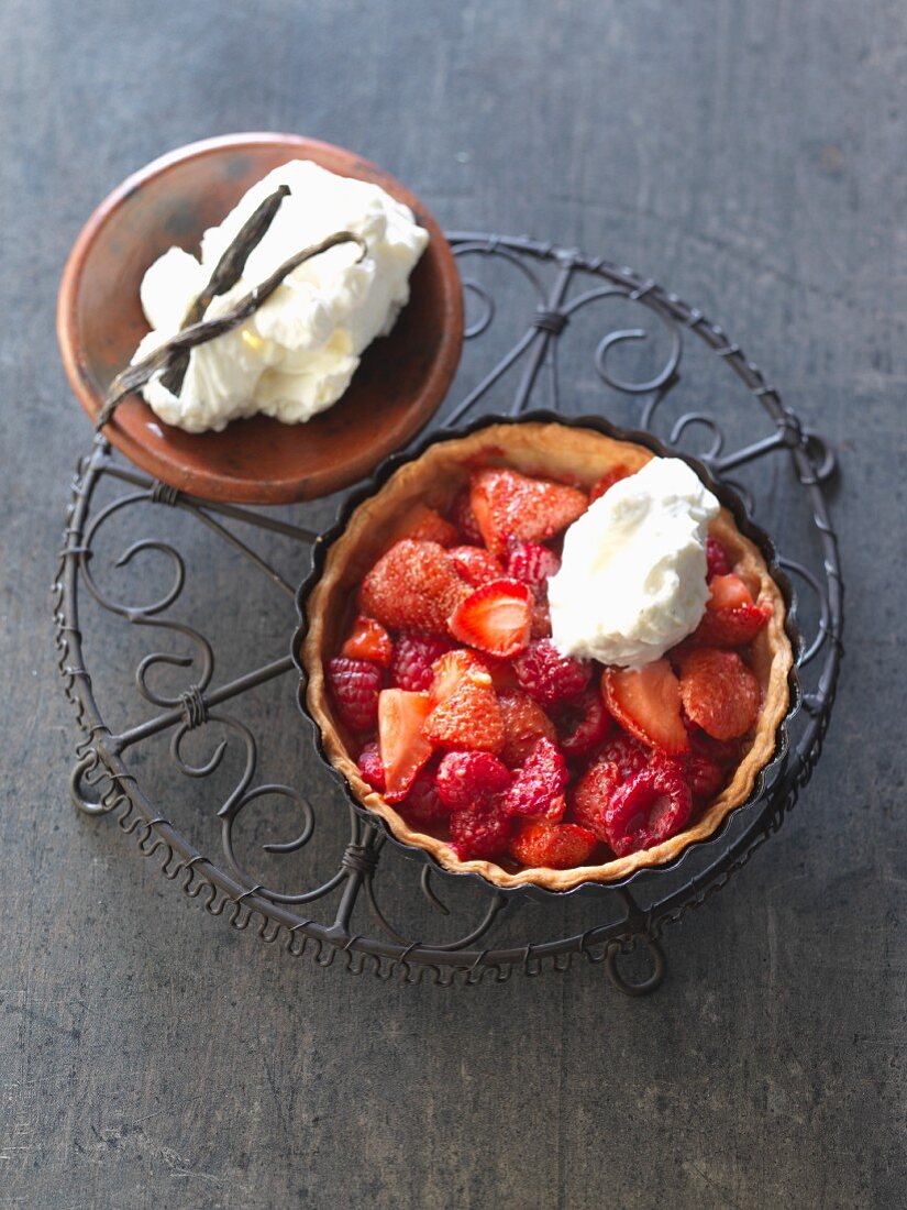 A berry tart on a decorative grill