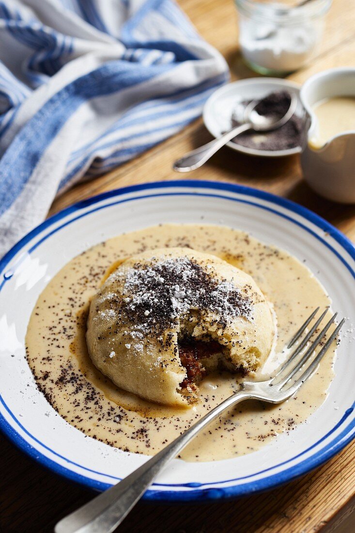 A yeast dumpling with brown butter, poppy seeds, and vanilla sauce