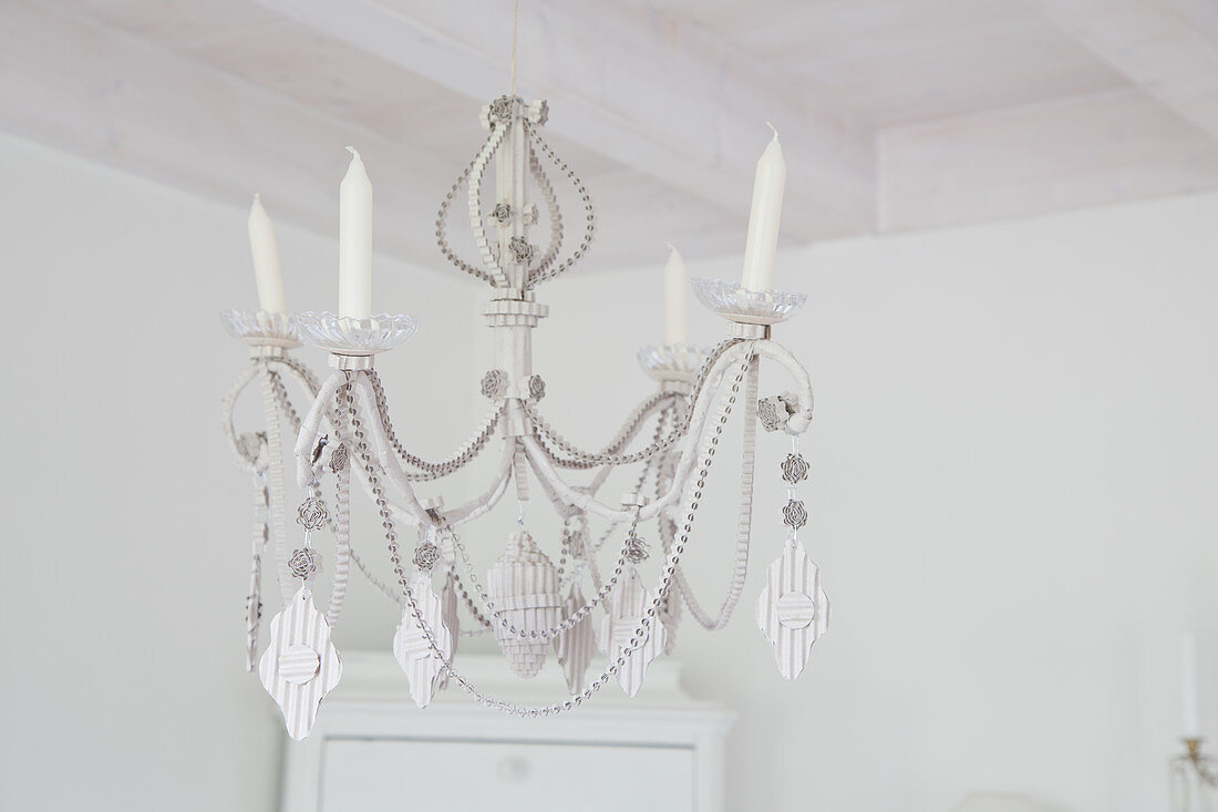 Chandelier with ornaments and decorations made from corrugated cardboard