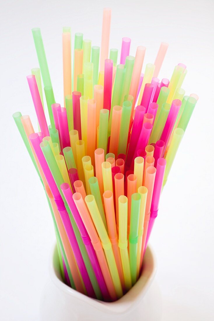Colourful neon straws in a pitcher