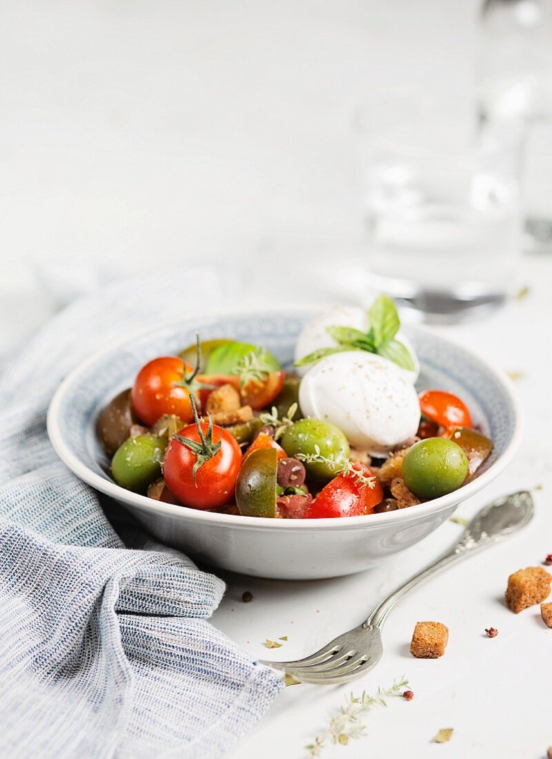 Caprese salad over white table