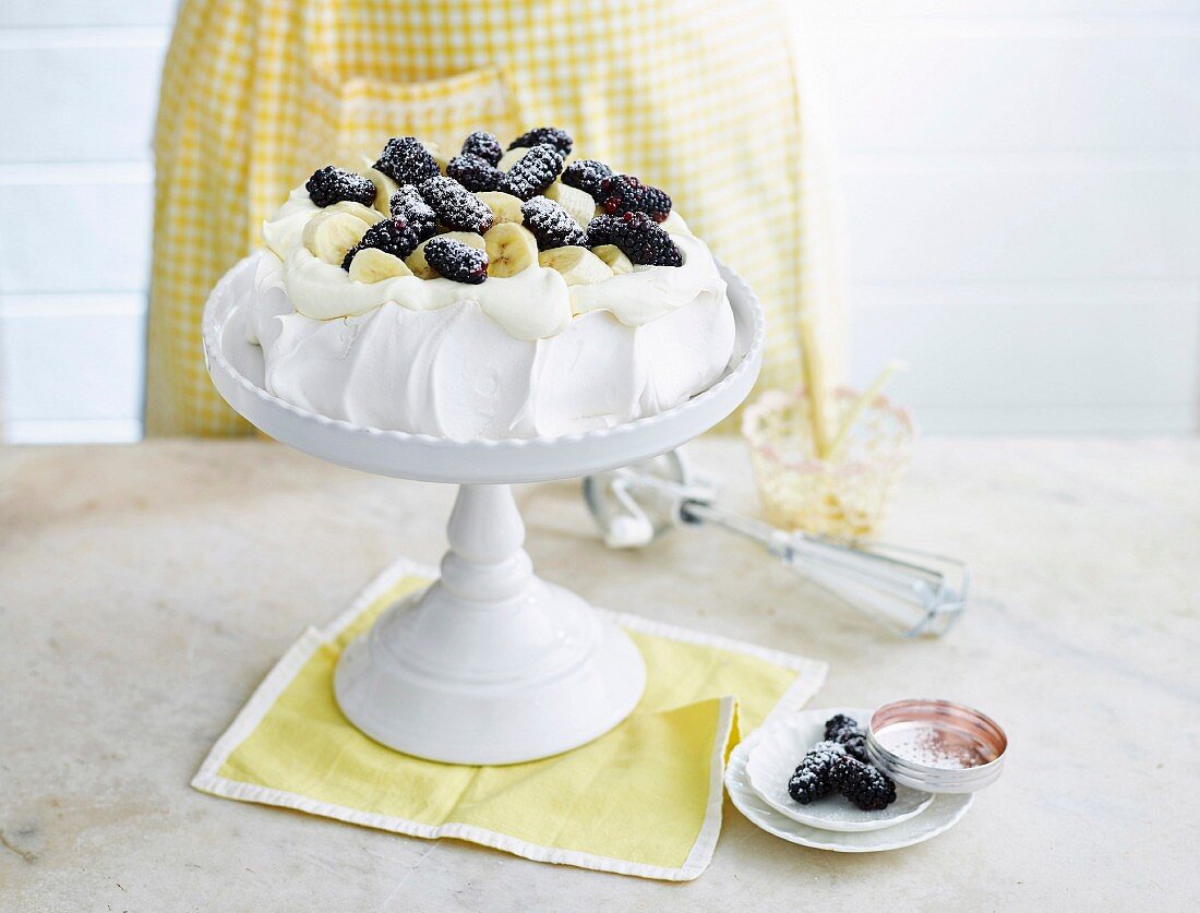 Simple Pavlova with bananas and blackberries