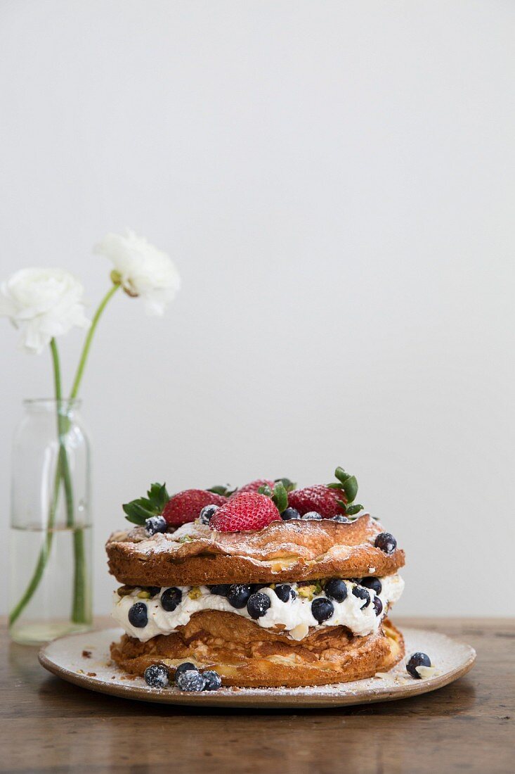 A layereed cream sponge and fruit cake