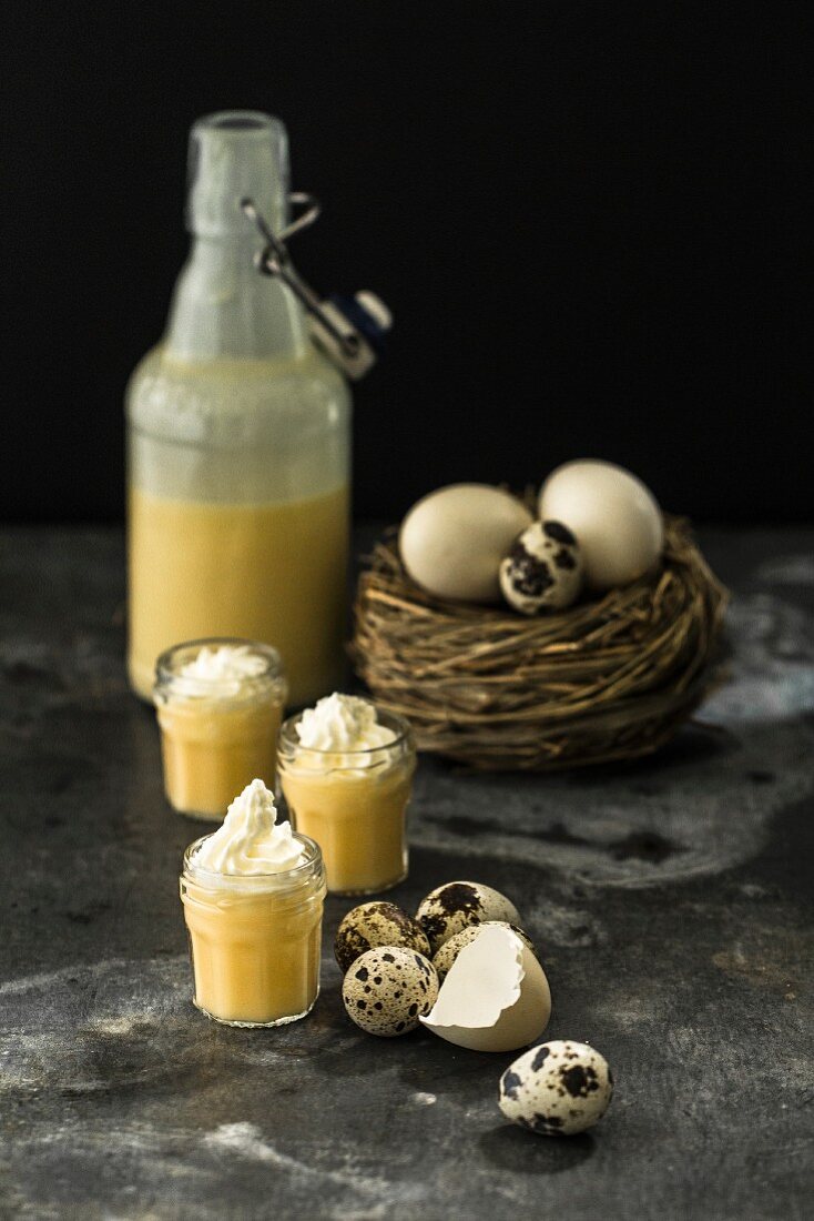 Homemade egg liqueur with whipped cream