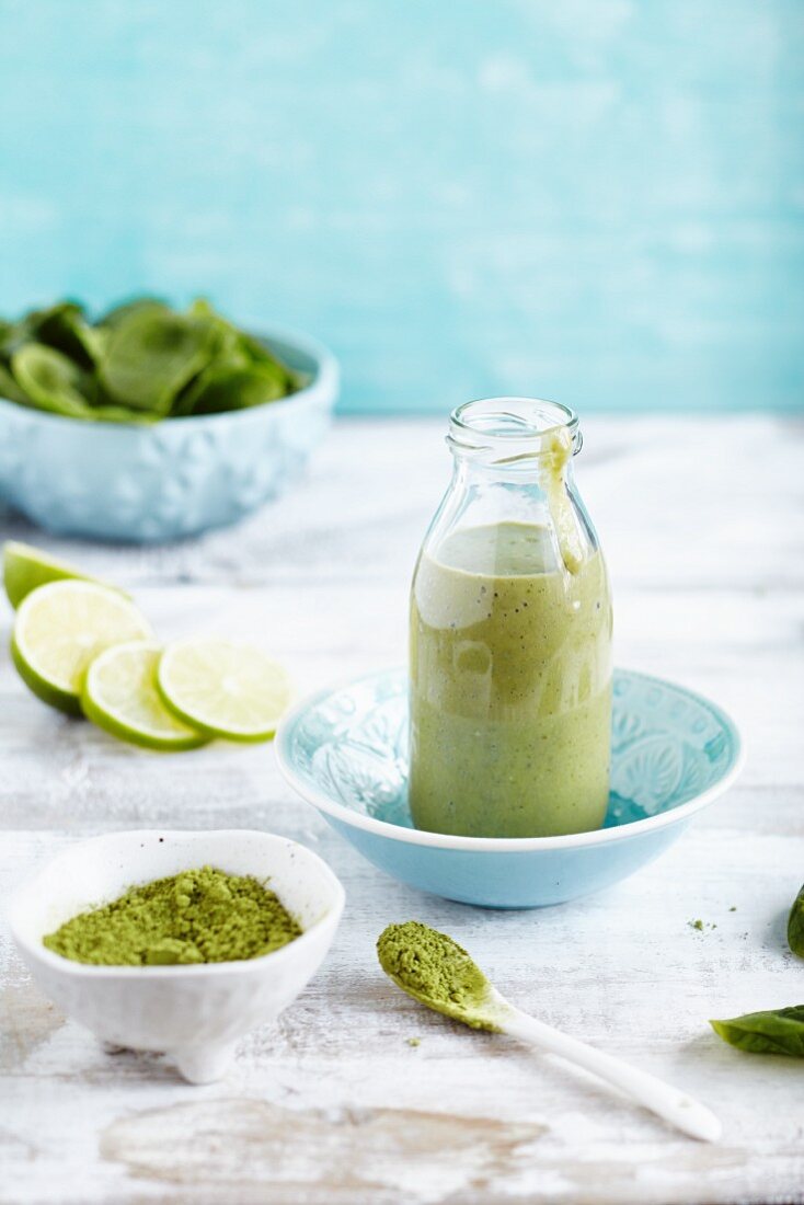 A lime and spinach smoothie with matcha tea