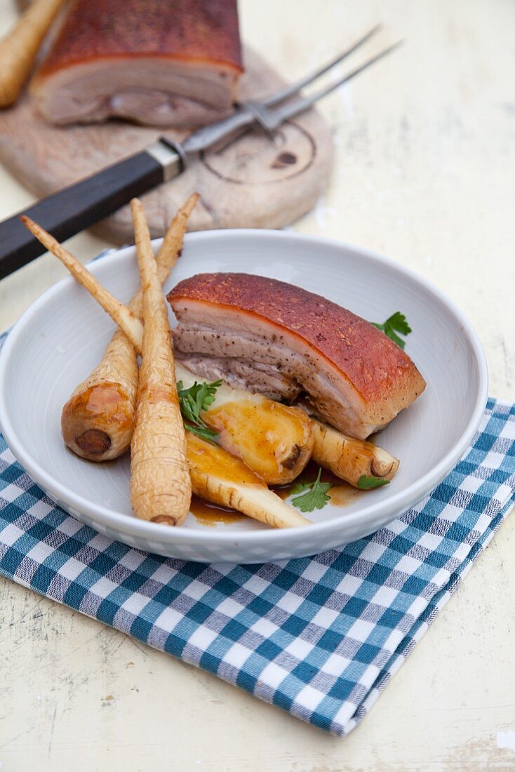 Confit parsnips with crackling