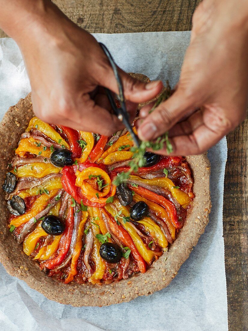 Roasted pepper and olive tart with anchovies