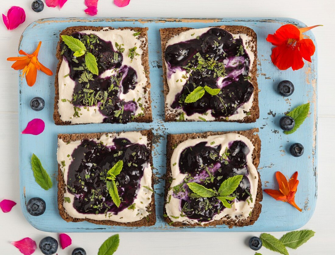 Vegan yogurt and blueberry jam on toast