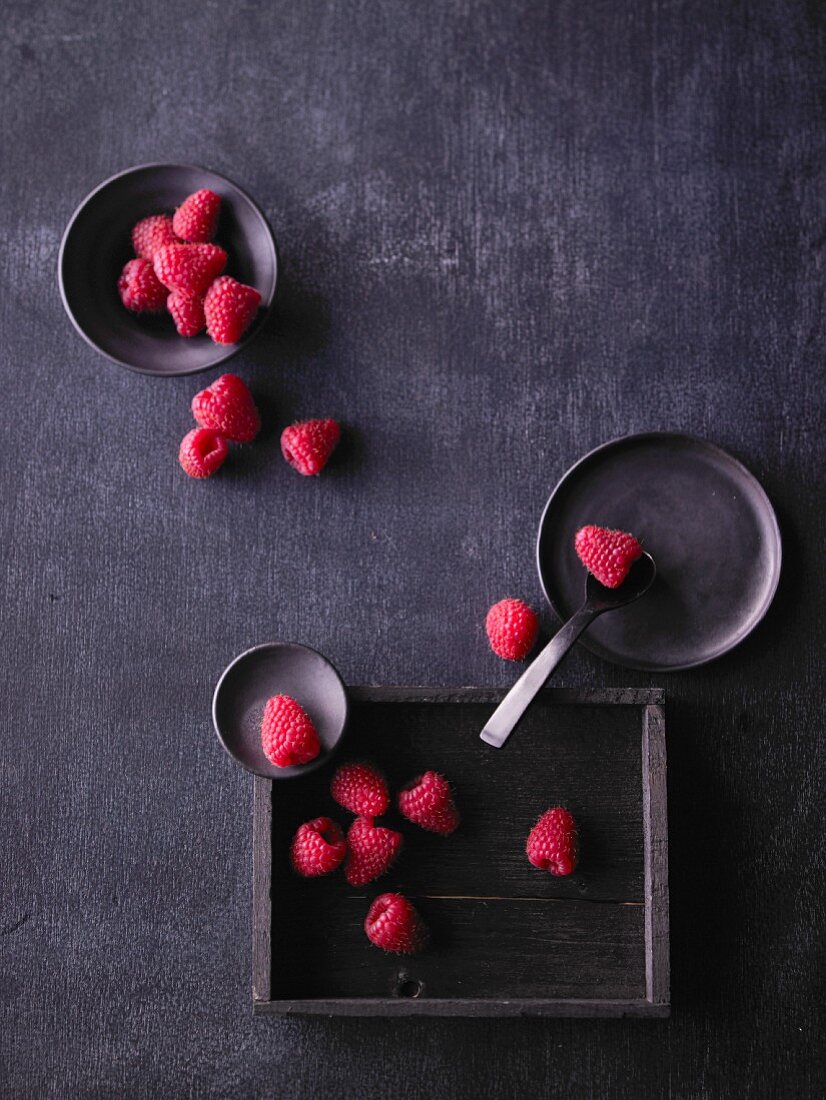 Raspberries on a dark background