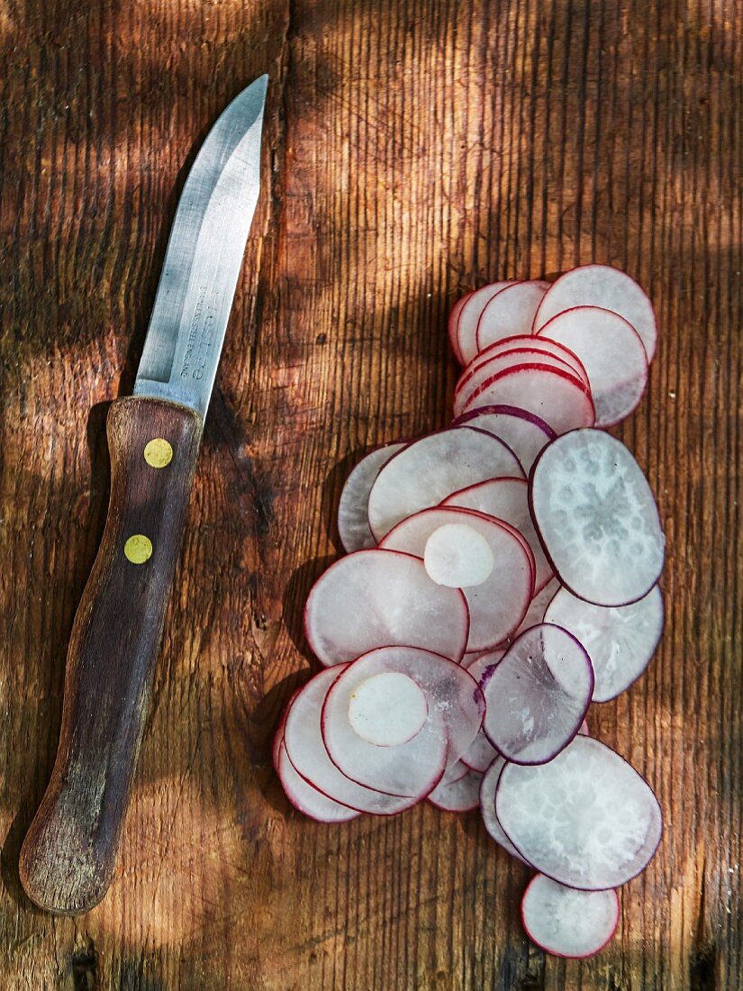 Cut board with radishes