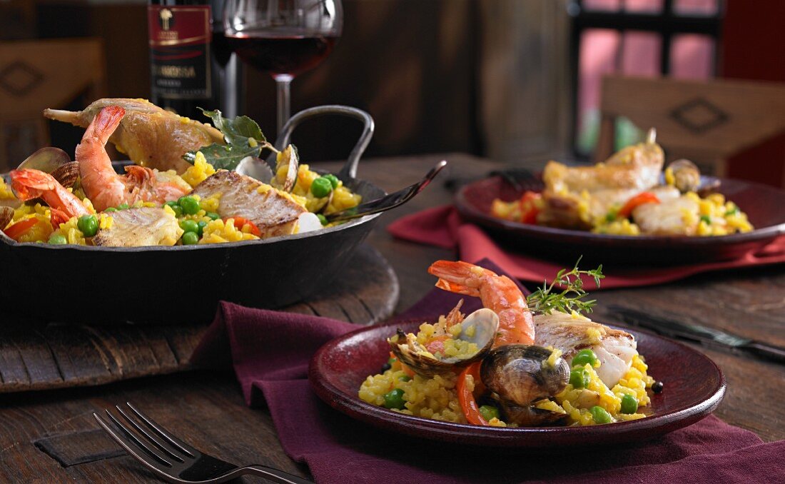 Spanish paella with cod, prawns and mussels