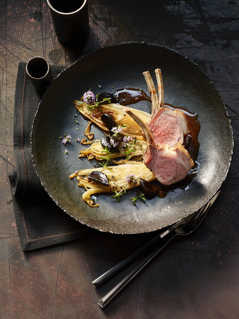 Heidschnucke lamb on chicory with black garlic