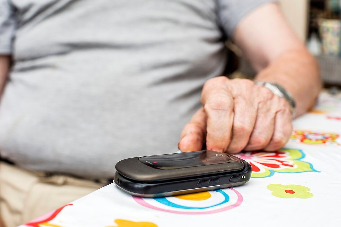 Elderly man's mobile phone