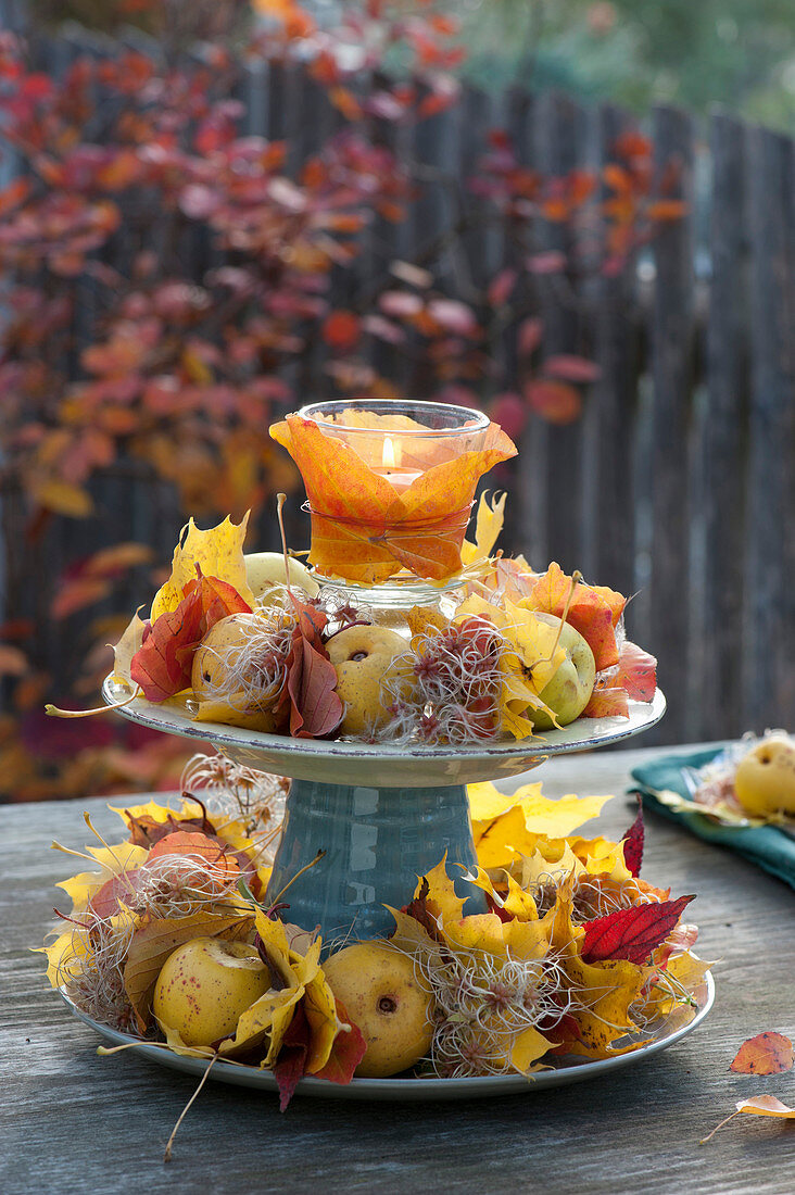 Home-made cake stand with plates and cups