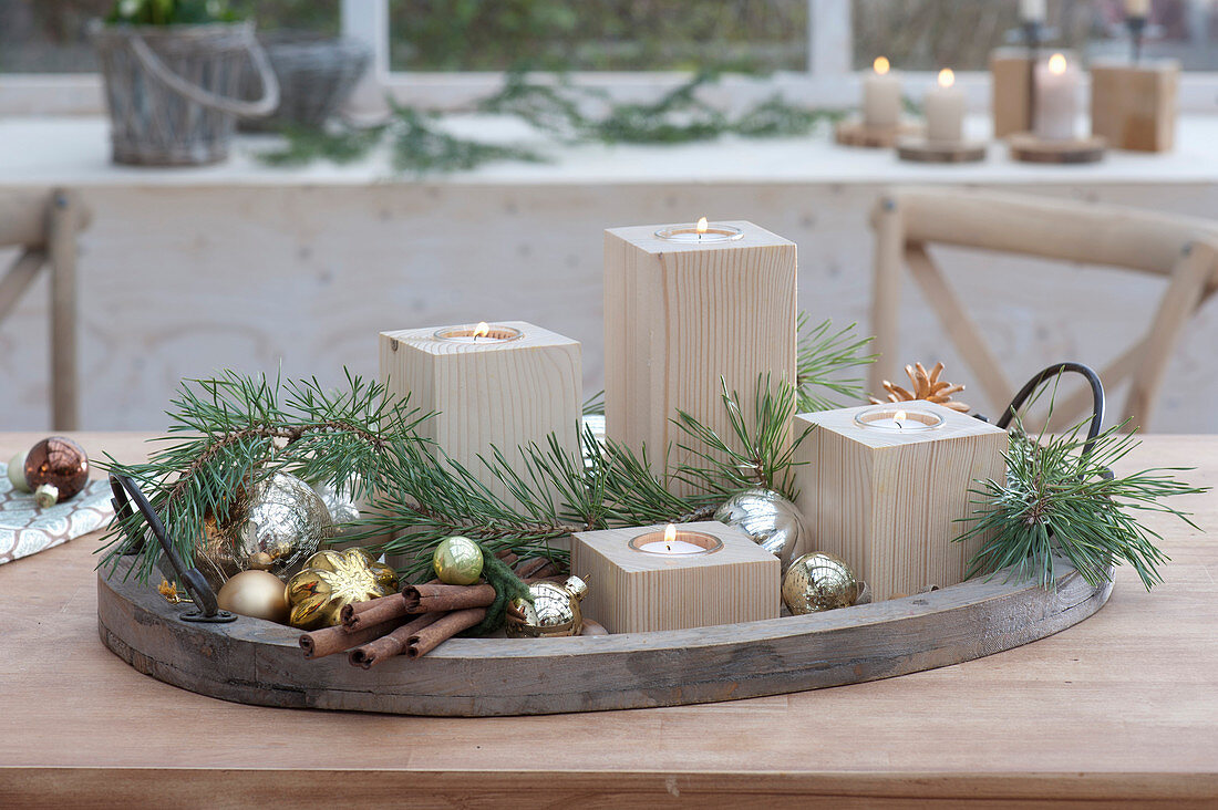 Fast Advent wreath with tealight holders made of wood on tray