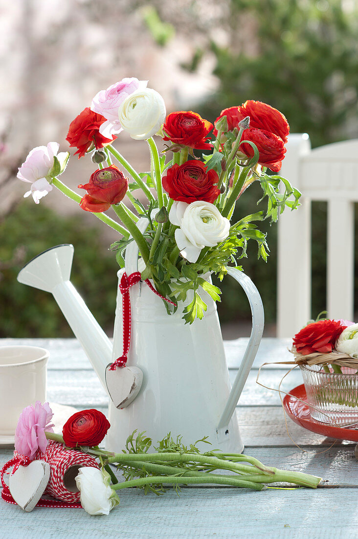 Bouquet made of ranunculus in watering can