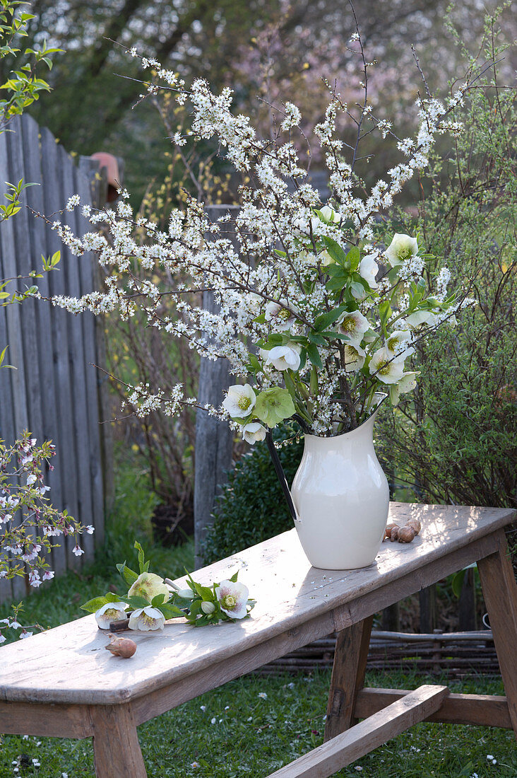 White bouquet of Prunus spinosa and Helleborus branches