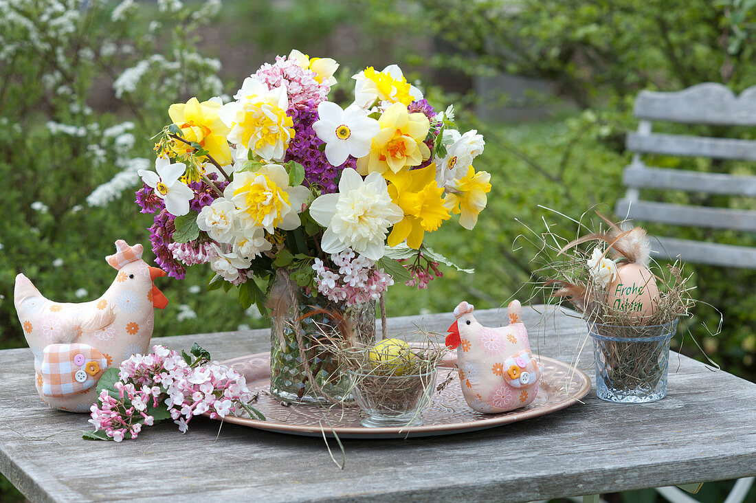 Fragrant bouquet of mixed narcissus (narcissus), twigs