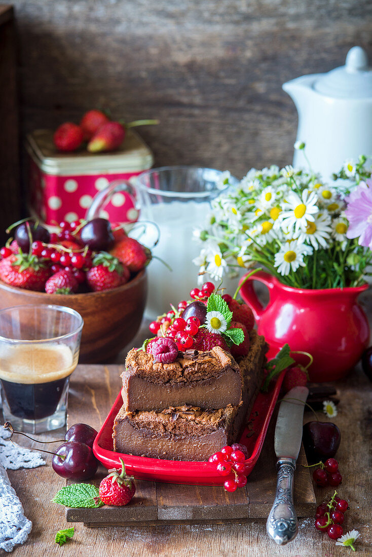 Chocolate magic cake with fresh berries