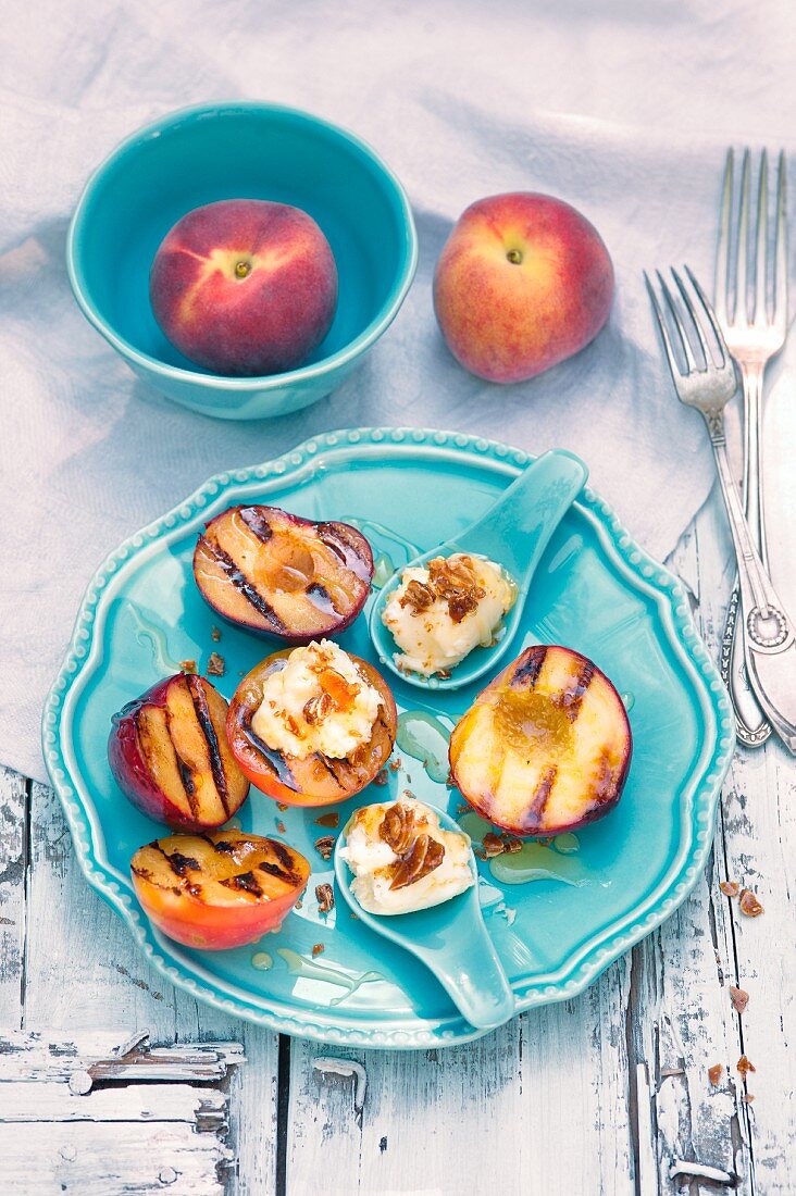 Grilled peaches with peach ice cream