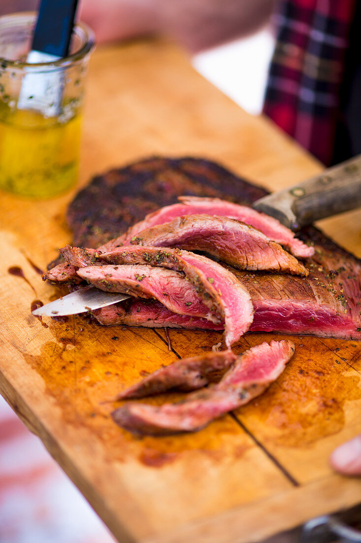 Grilled flat steak, sliced