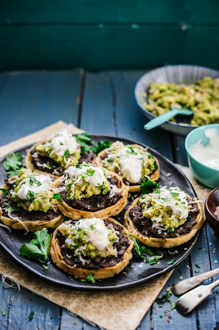 Sopes with guacamole and fried beans (Mexico)