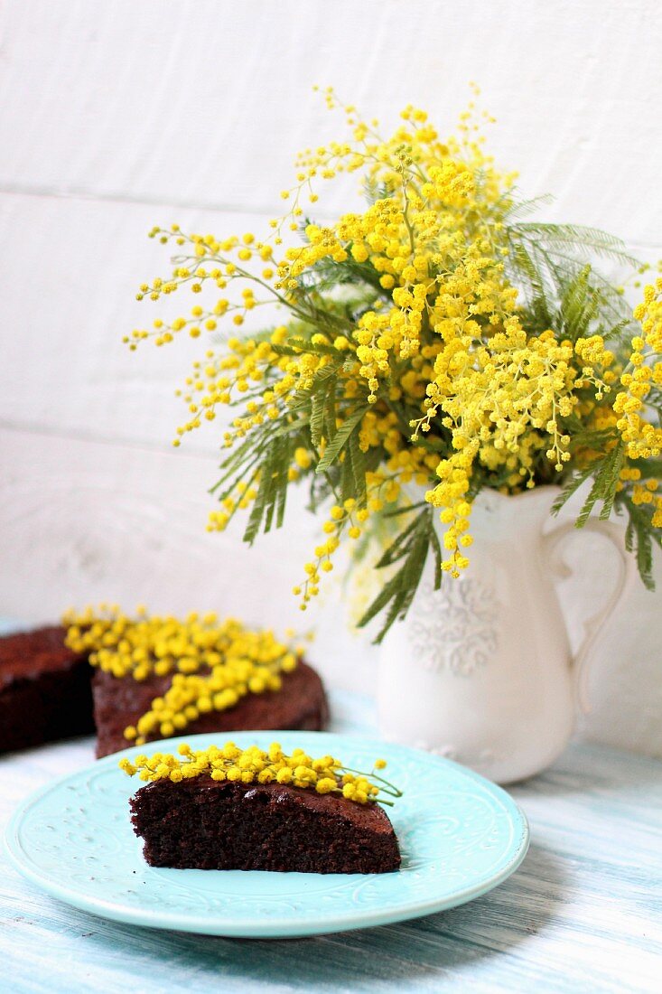 Chocolate cake with yellow flowers