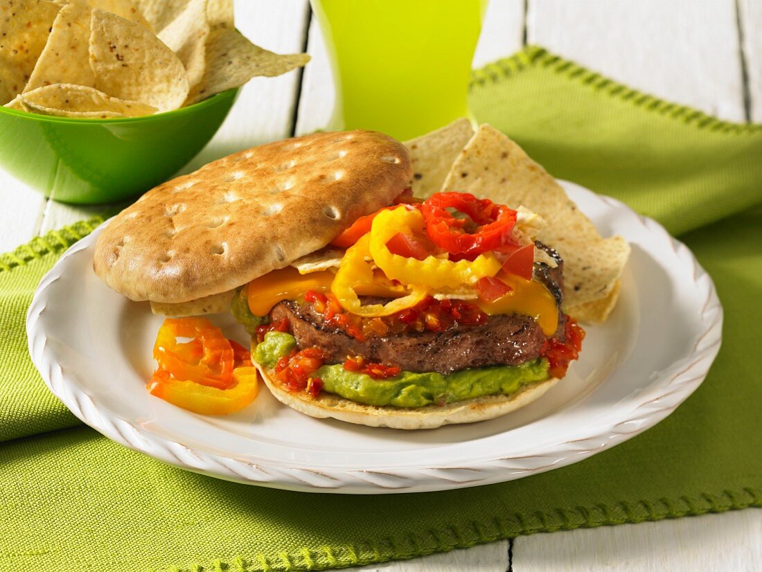 Beef burger with guacamole and hot peppers