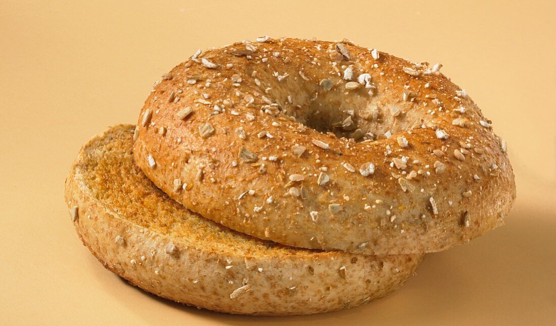 A toasted wholegrain bagel, sliced