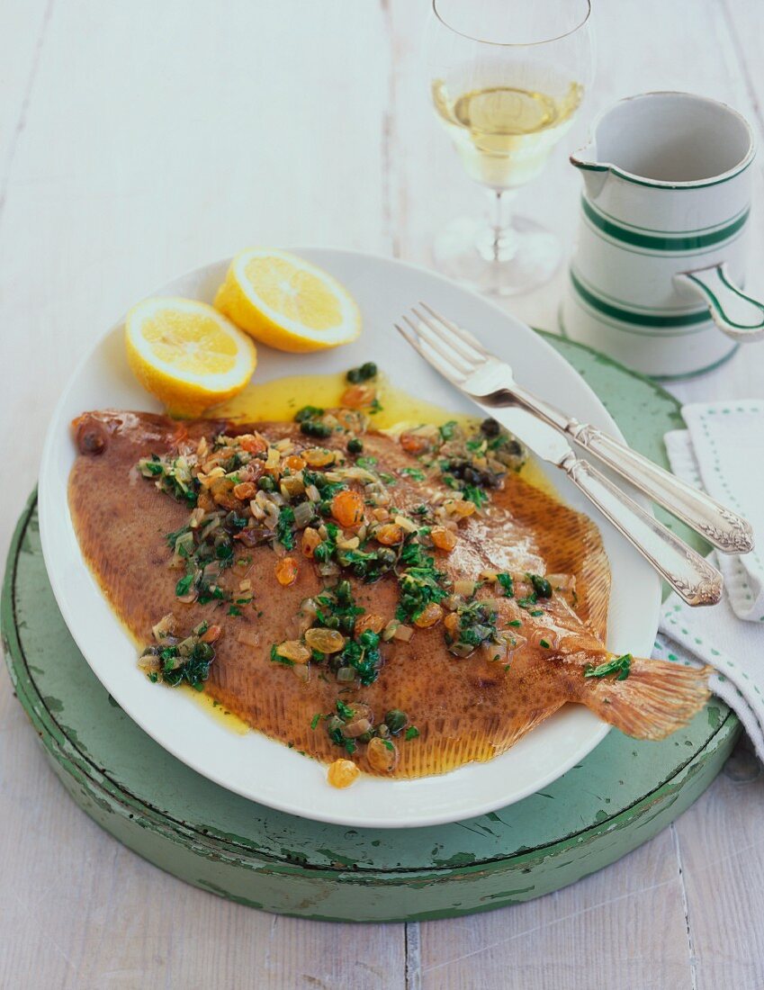 Plaice with herbs and lemon slices
