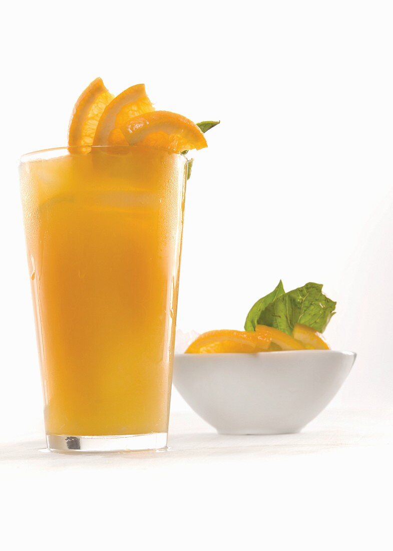 Fresh-squeezed orange juice garnished with orange slices
