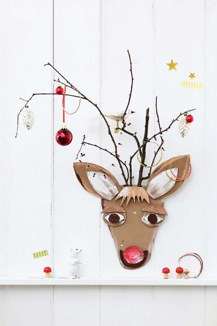 DIY Rudolph made from cardboard with twig antlers
