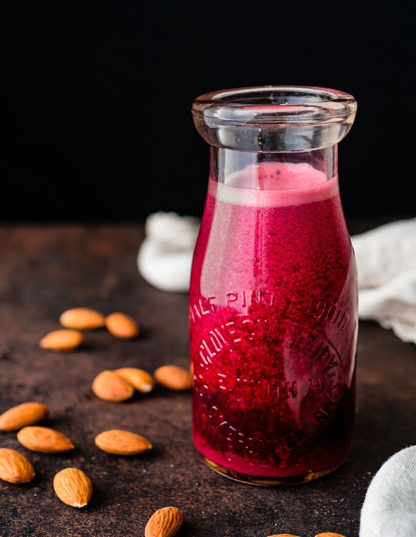 Pomegranate juice in a glass jug