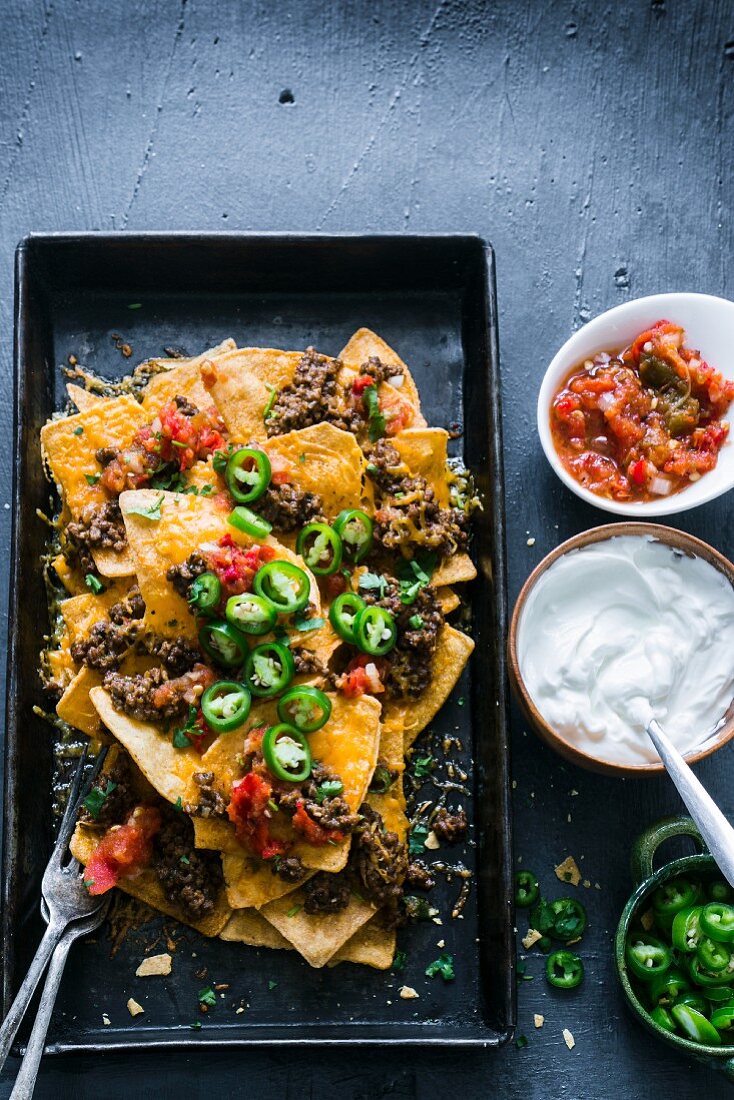 Chili nachos with cheese and jalapenos
