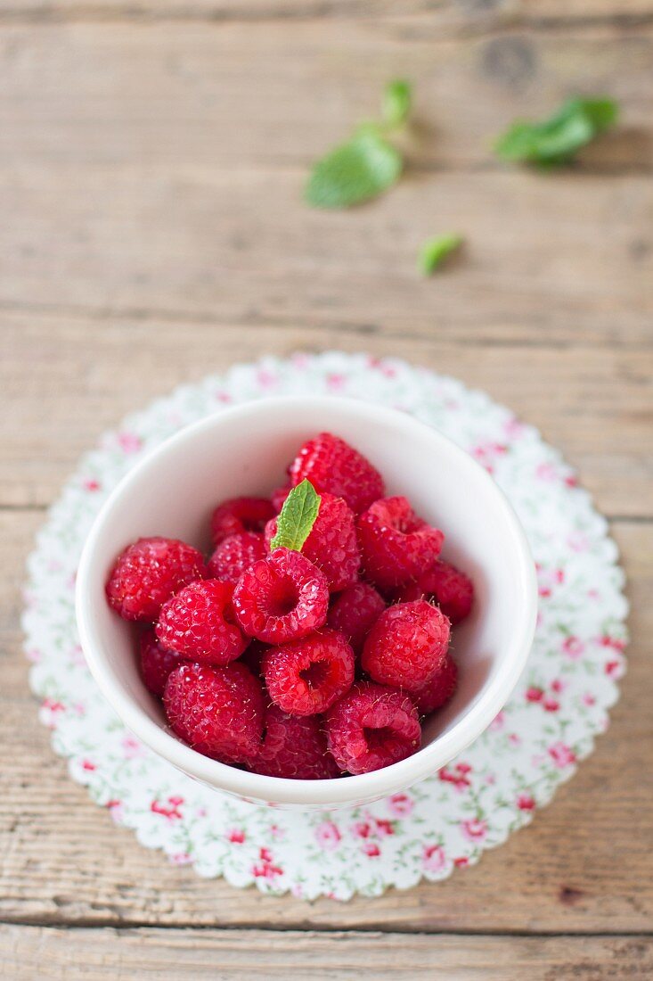 Raspberries in a small bowl