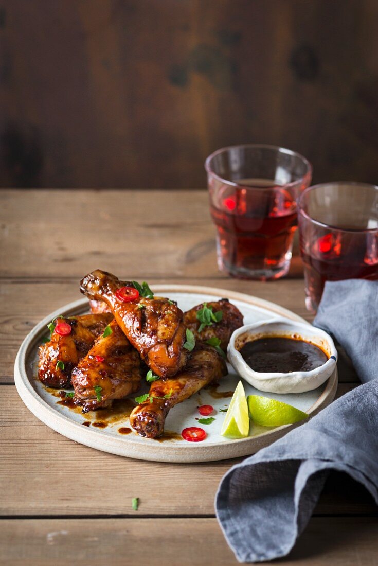 Roasted sticky chicken drumsticks with honey and chili