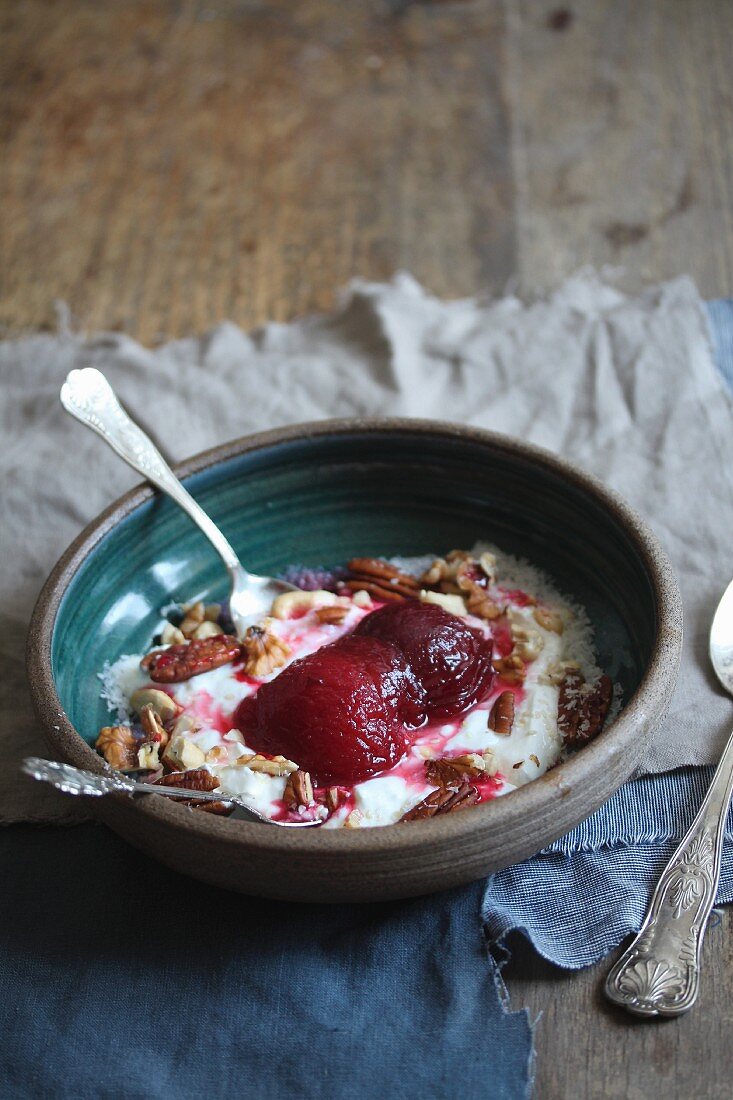 Poached plum in yoghurt