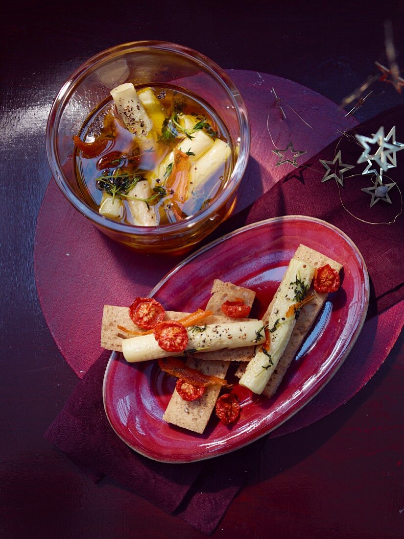 Crispbread with pickled goat's cheese and oven-dried tomatoes for Christmas