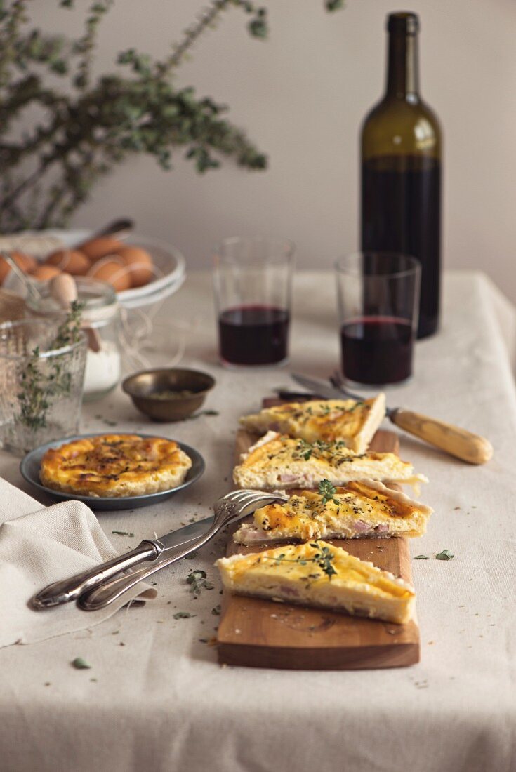 Quiche lorraine in a rustic table setting