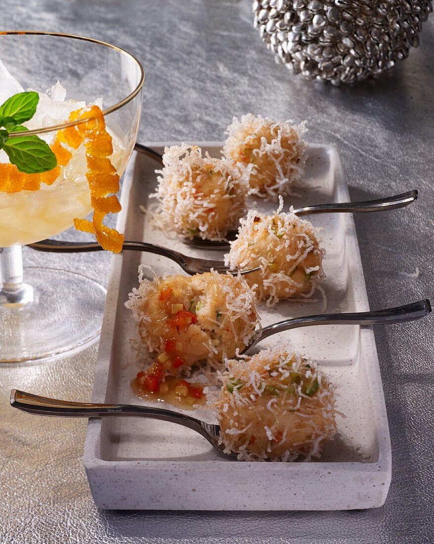 Exploding shrimp balls with glass noodles and spicy ginger sauce