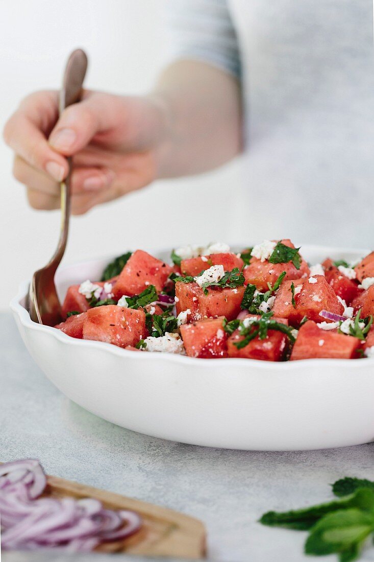 A watermelon salad with feta cheese and mint