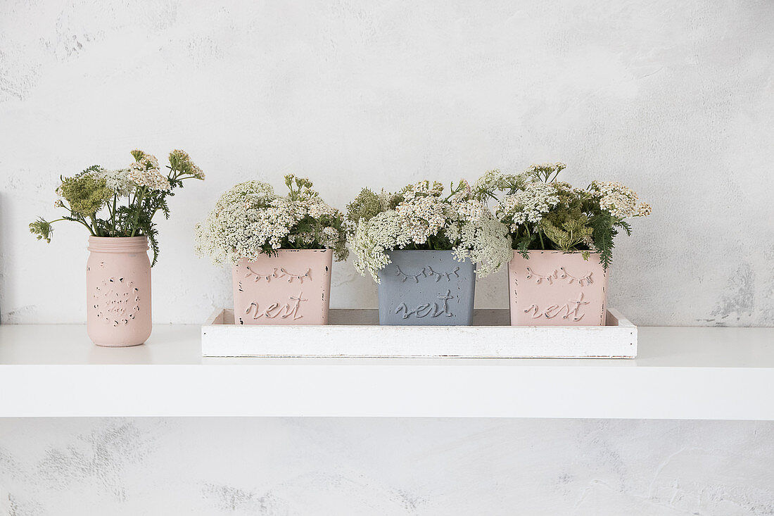 Planters made from glass jars painted with chalk paint