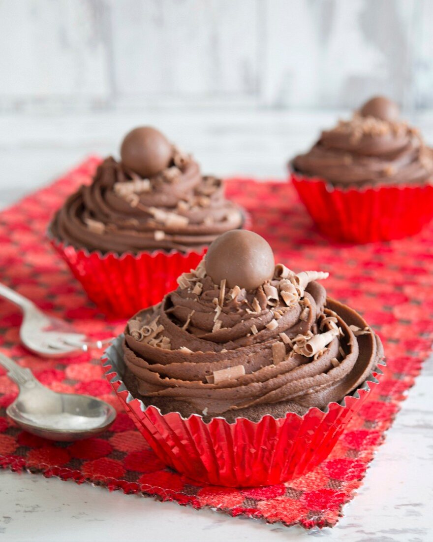 Cupcakes with chocolate frosting and chocolate balls