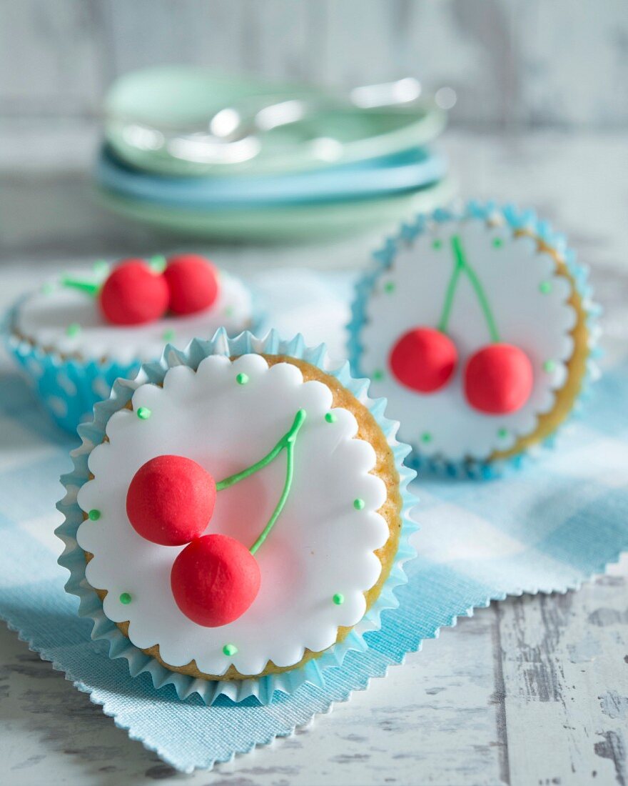 Cupcakes with marzipan cherries