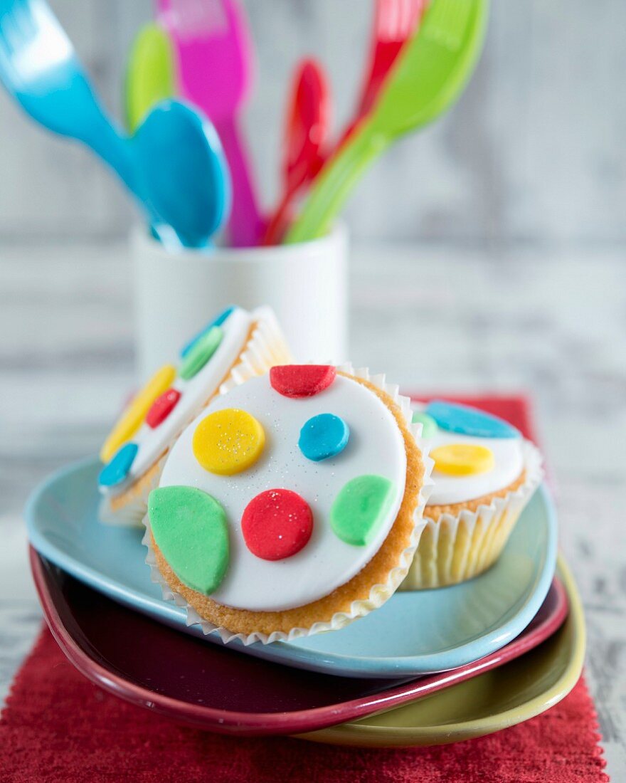 Cupcakes with colourful fondant dots